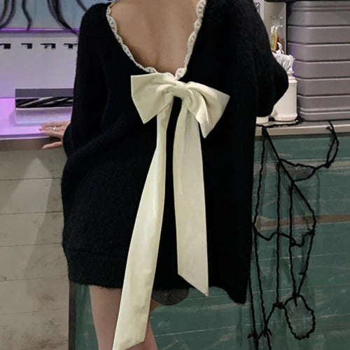 Oversized knit sweater for women with V-neck and delicate lace trim Amarae