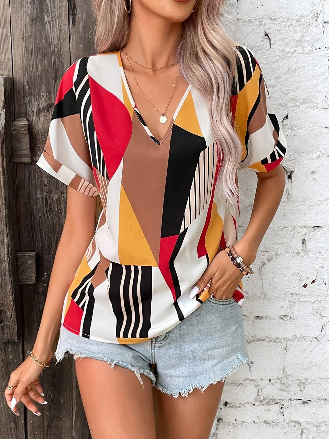 Ladies V-neck top geometric print Lune London
