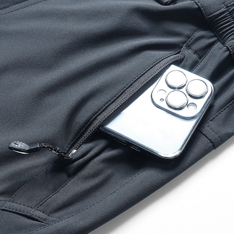 Men's softshell functional pants with knee pre-shaping, adjustable waistband, and integrated belt loop Amarae