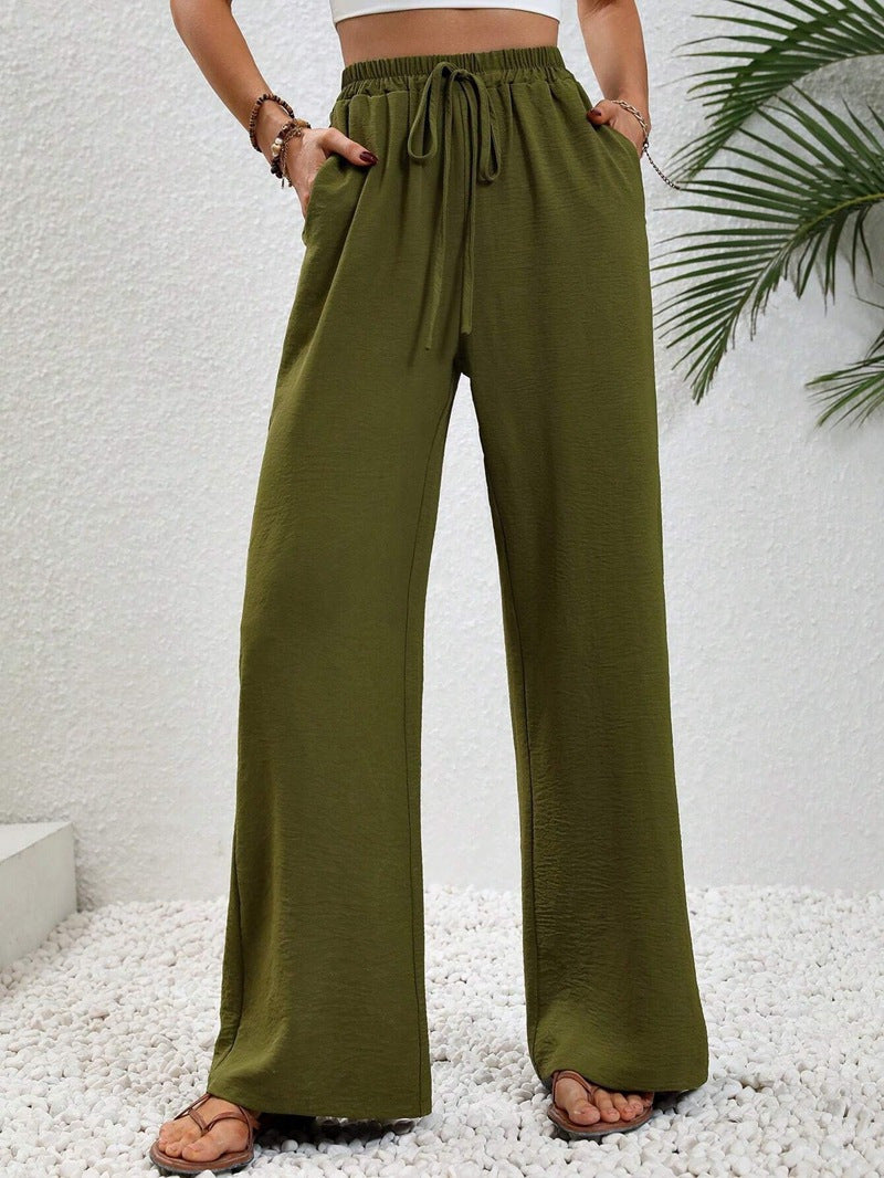 Loose-fit leisure pants for women with an elastic waistband and practical side pockets Lune London