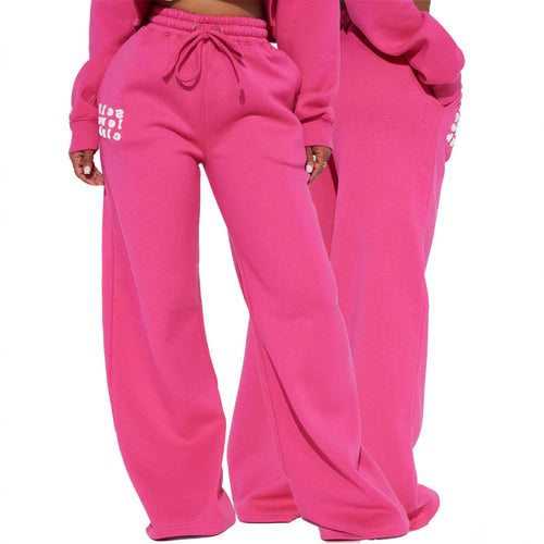 Women's wide jogging pants with elastic waistband and eye-catching lettering Chic & Stil
