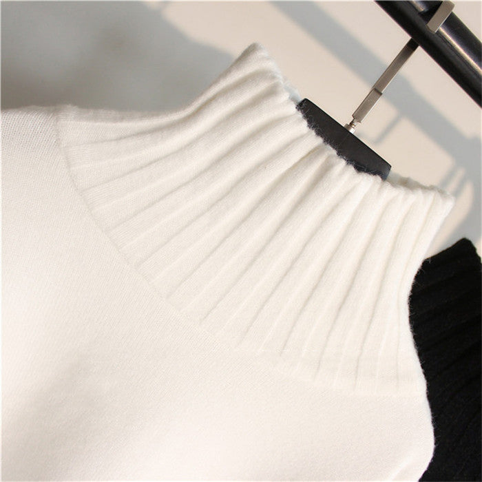 Oversized turtleneck pullover for women with split sleeves and ribbed texture Lune London