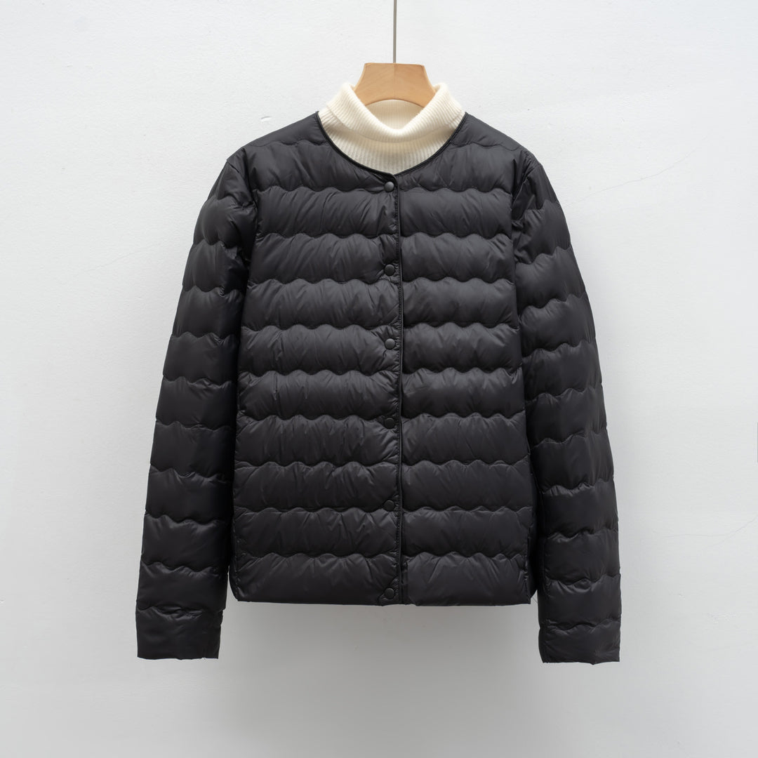 Ladies lightweight quilted jacket with high collar and elastic cuffs Lune London