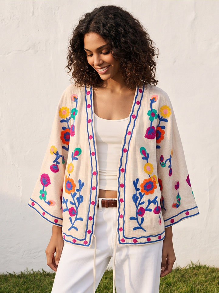 Women embroidered linen wrap jacket with folkloric flower appliqués Amarae