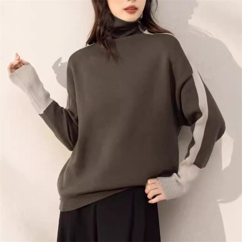 Sweatshirt oversized pour femmes avec col montant moderne et accents de manches contrastants Chic & Stil