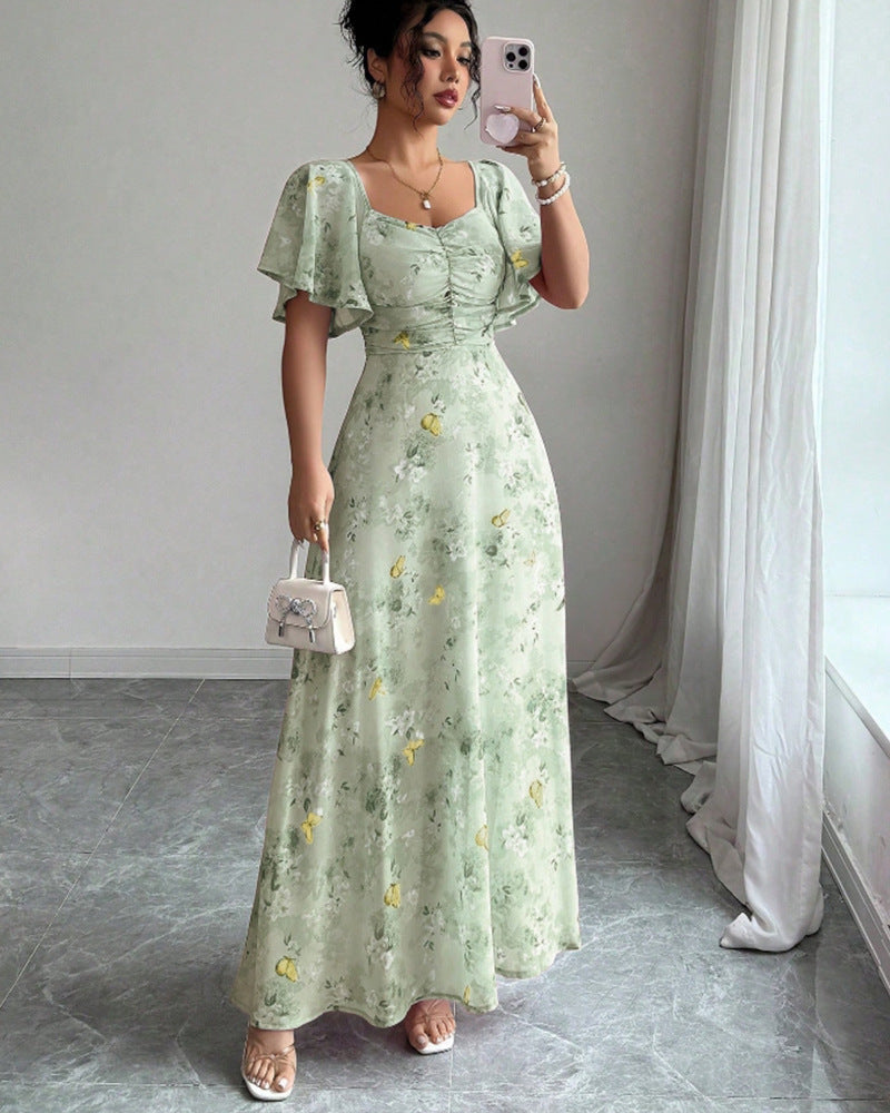 Women's maxi dress with flowing cut and romantic floral pattern Lune London