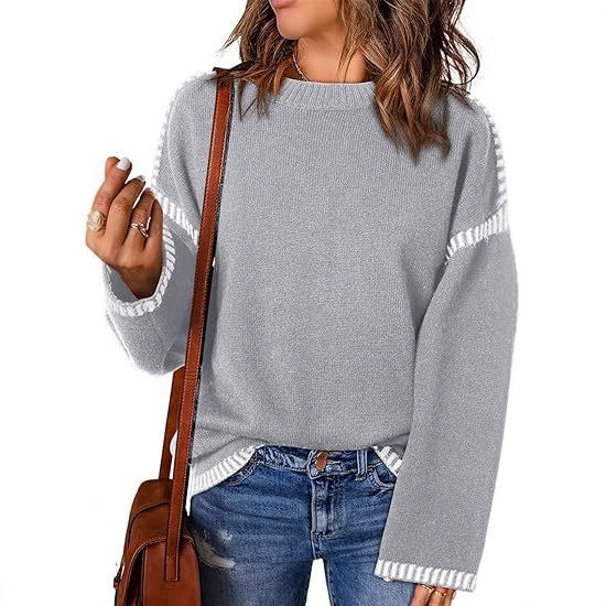 Fashionable women's sweater with structured material and stripe-shaped details Lune London