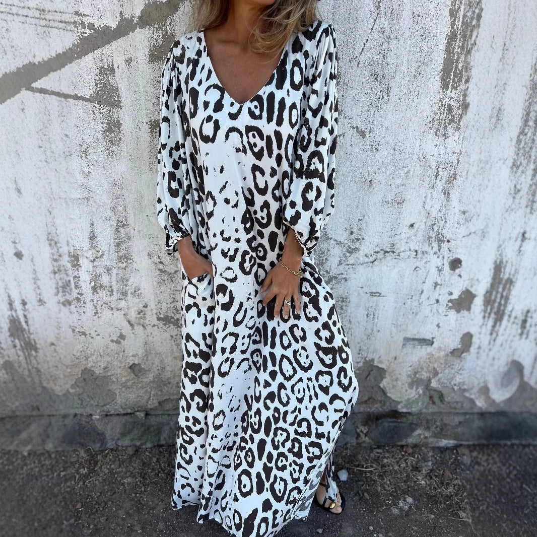 Maxi dress for women with deep V neckline and side pockets Lune London