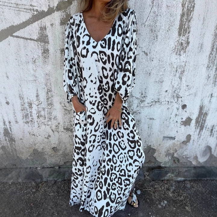 Maxi dress for women with deep V neckline and side pockets Lune London