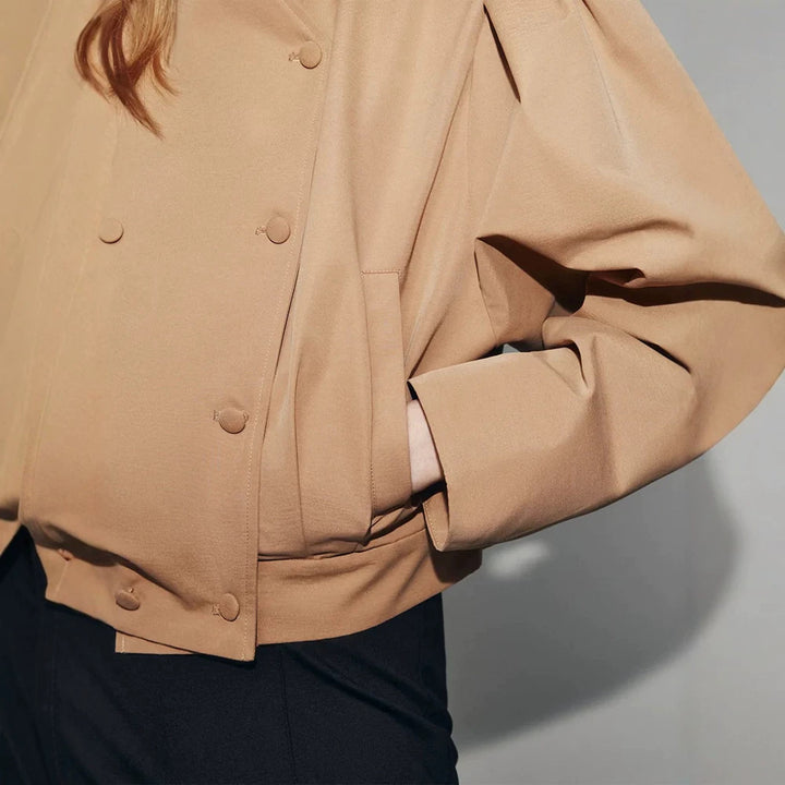 Women's short jacket in a boxy cropped cut with double button placket and structured shoulder pleats Amarae