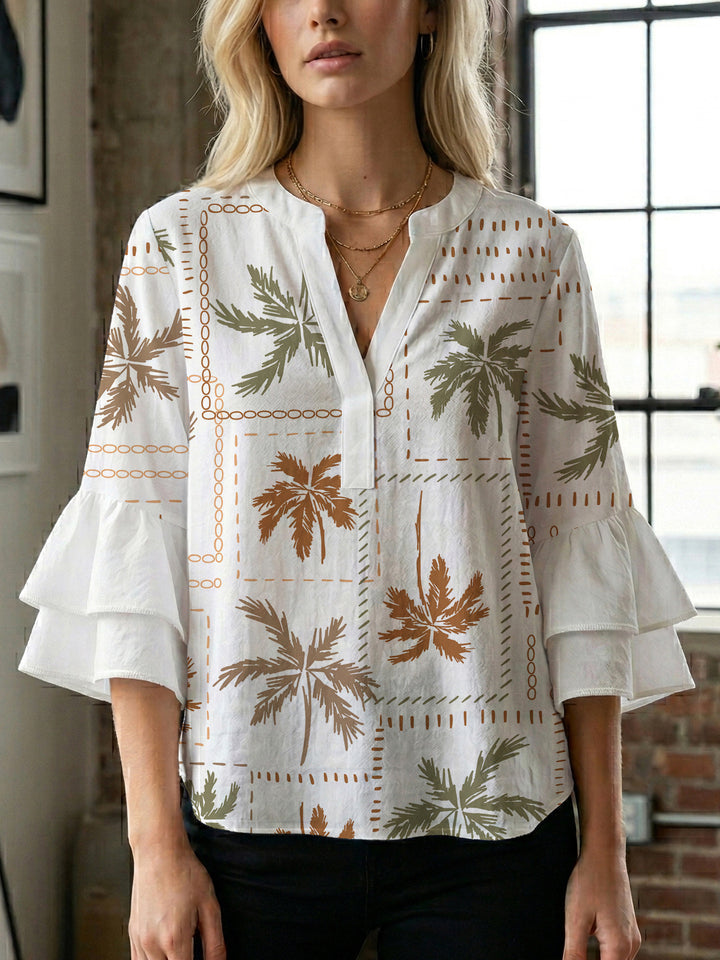 Women's blouse with ruffle details and eye-catching animal print Lune London
