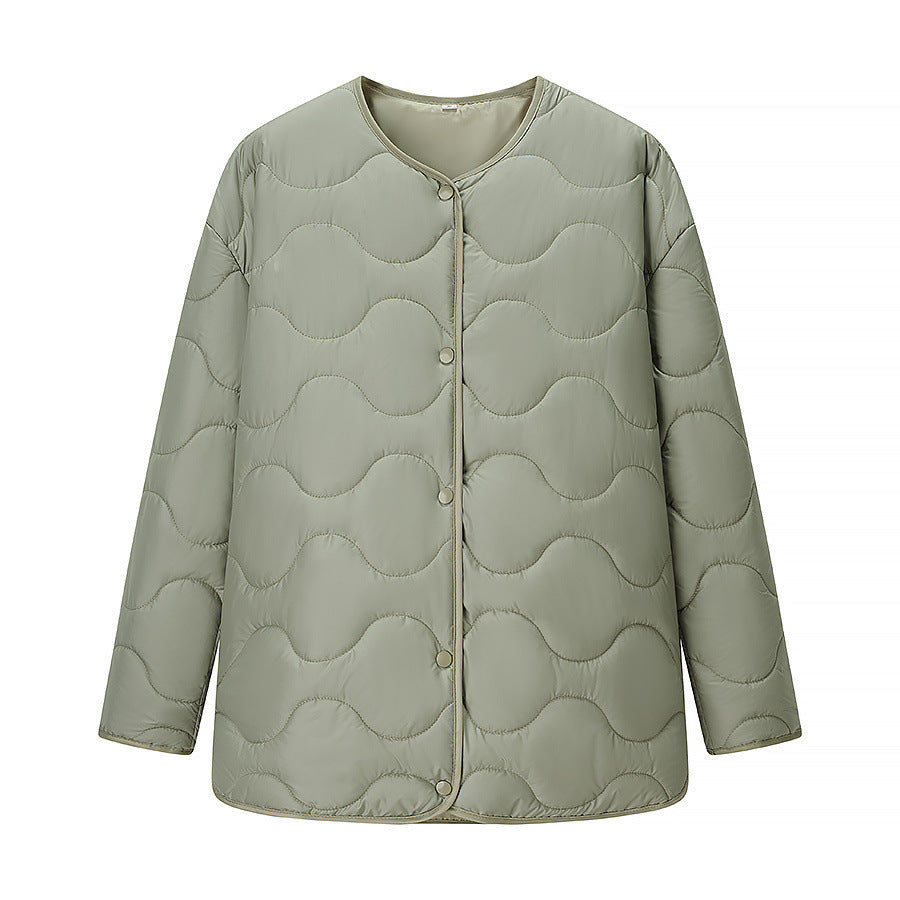 Quilted transition jacket for women with a soft fabric texture and practical snap buttons Lune London