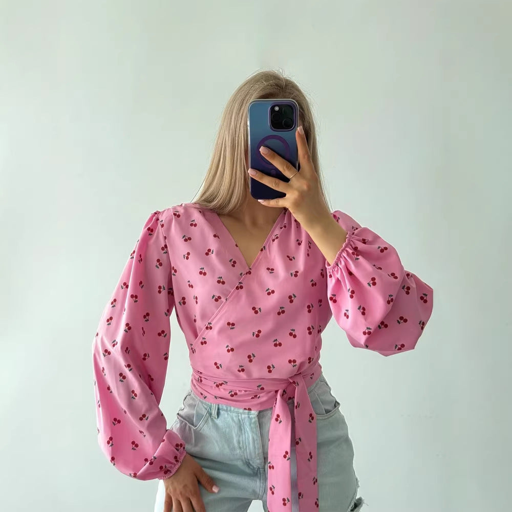 Women's wrap blouse with cherry print, wide puff sleeves & tie belt Amarae