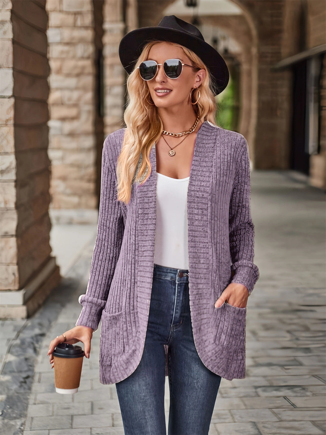 Knitted women's jacket with an open front closure and trendy ribbed structure Lune London