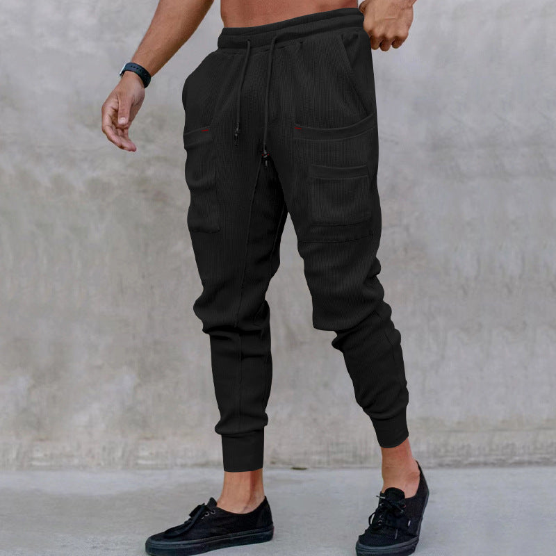 Casual men's jogger pants with practical side pockets and elastic waistband Lune London