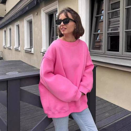 Woman Oversized sweatshirt with a relaxed fit and modern chic accents and style