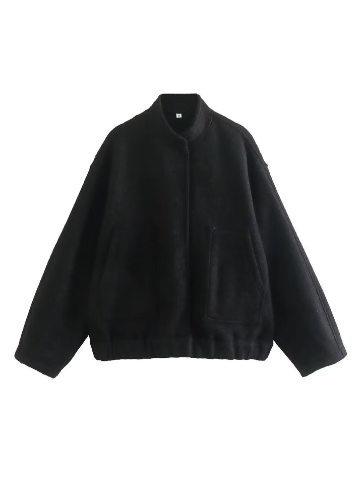 Oversized knit jacket for women in soft teddy fabric with a high collar and side pockets Lune London