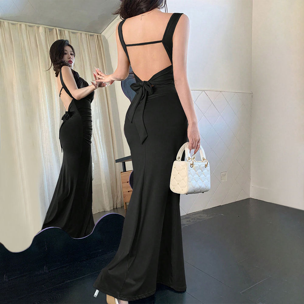 Robe de soirée élégante pour femmes avec découpes raffinées au dos et ceinture décorative à nouer Chic & Stil