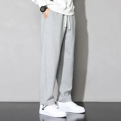 Casual jogger pants for men with elastic waistband and zippered pockets on the sides Amarae