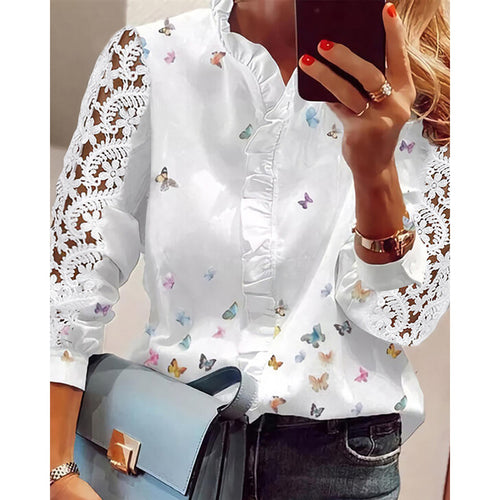 Women's blouse with floral appliqués, ruffle details, and lace sleeves Amarae