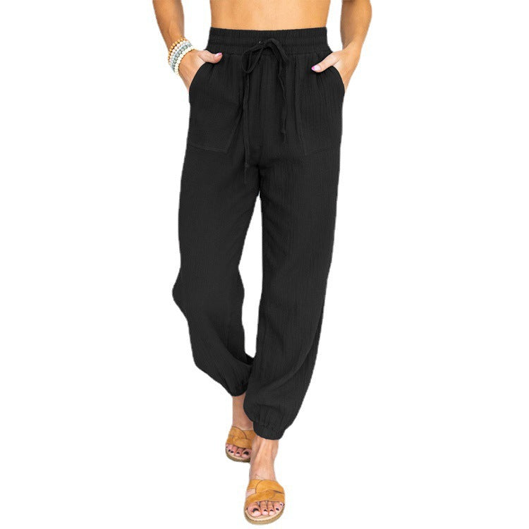 Light leisure pants for women with elastic waistband and side pockets Lune London