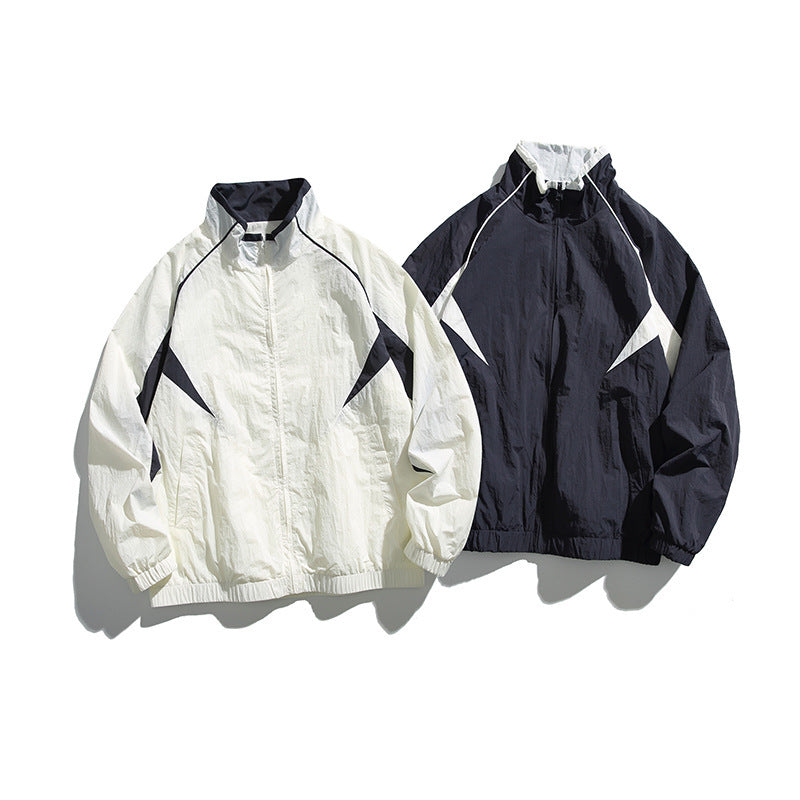 Unisex Lightweight Boxy Hooded Jacket in Windbreaker Style with Contrast Panels and Raglan Sleeves Amarae