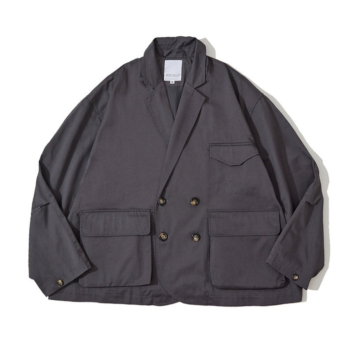 Unisex Boxy Overjacket with double-breasted button placket, large utility patch pockets and short boxy cut Amarae