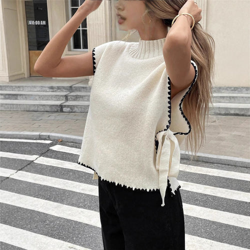Knit top for women with unique cutouts and a playful knot Amarae