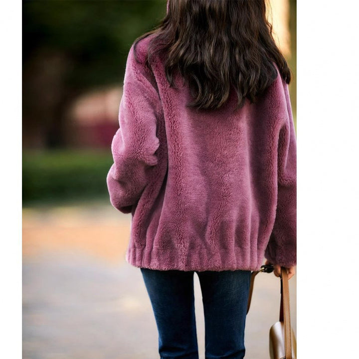 Women's plush jacket with high collar and side zipper Chic & Stil