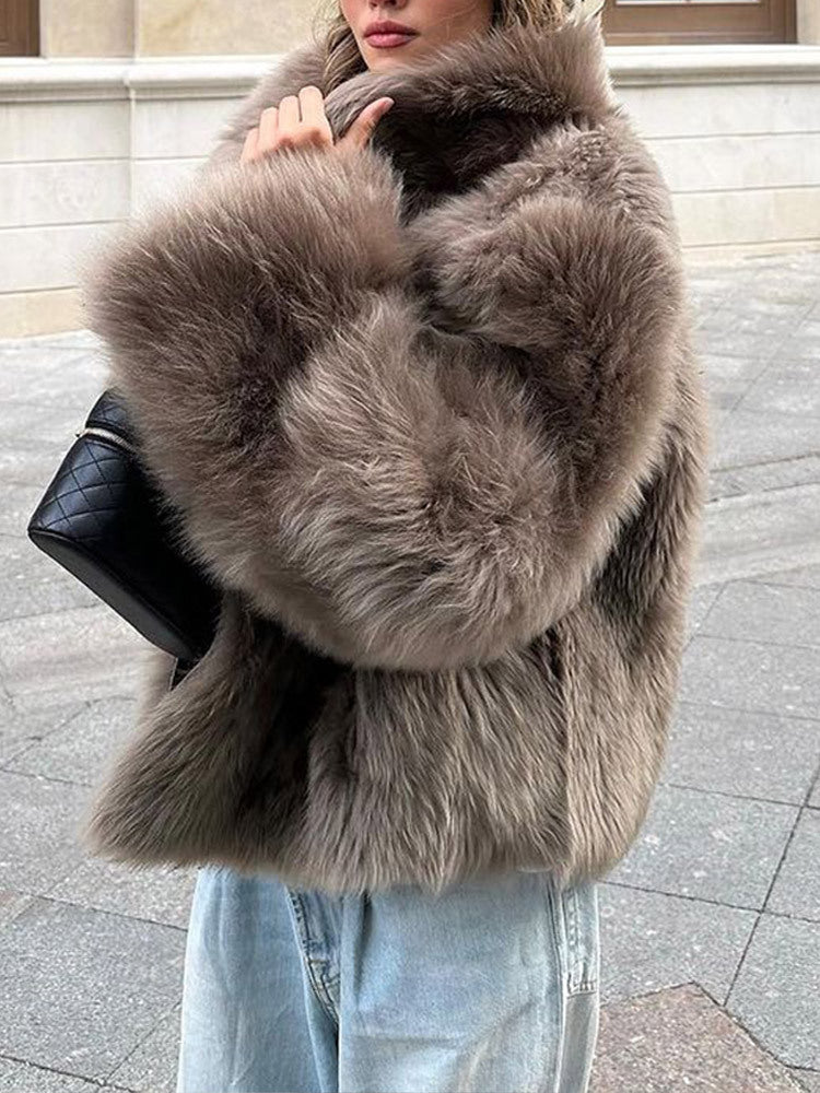 Ladies faux fur coat with high collar and luxurious design Lune London