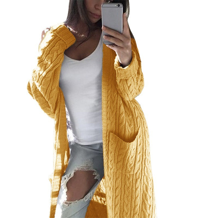 Women's knitted coat with patterns and practical pockets in an open cut Amarae