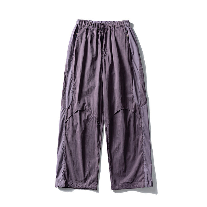 Men's loose technical nylon cargo pants with elastic waistband and panel details Amarae