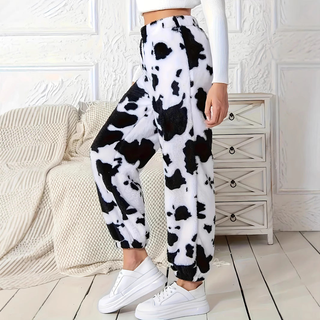 Ladies plush pants with a trendy cow spot pattern and elastic waist Lune London