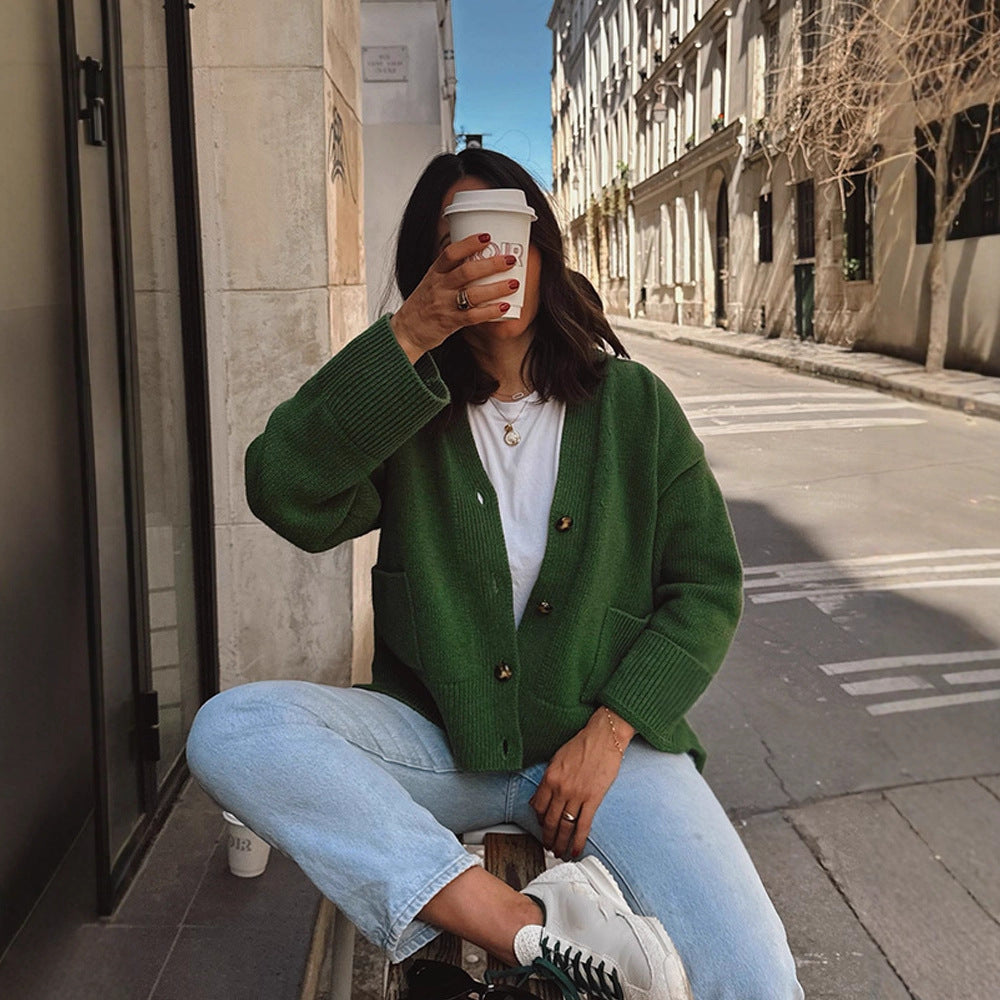 Women's oversized knit cardigan with decorative button placket, patch pockets, and elongated cuffs Amarae