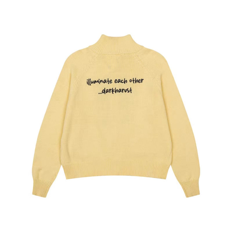 Women's chunky knit zip cardigan with stand-up collar, patch pockets and cartoon intarsia Amarae