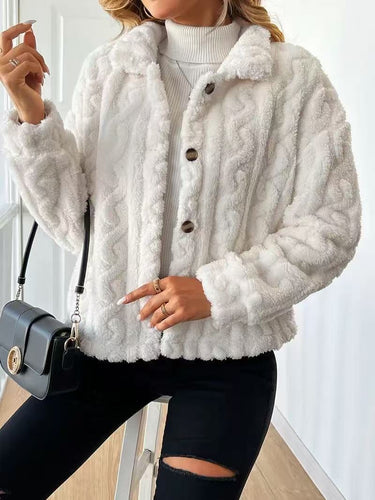 Women’s plush jacket with button closure and striped design.