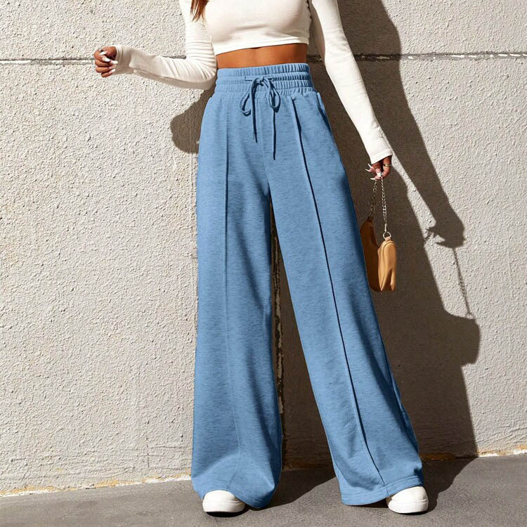 Wide sports pants for women with elastic waistband and side pockets Lune London