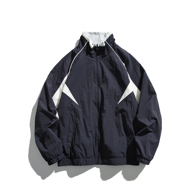 Unisex Lightweight Boxy Hooded Jacket in Windbreaker Style with Contrast Panels and Raglan Sleeves Amarae