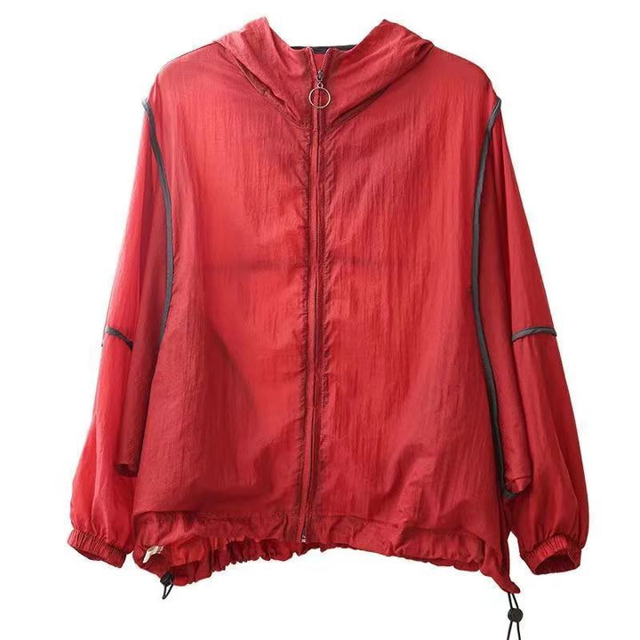 Women's lightweight hoodie jacket with elastic hem and reflective details Chic & Stil