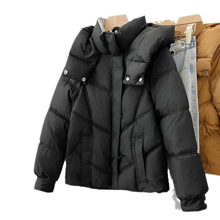 Quilted jacket with stand-up collar for women with practical pockets Lune London