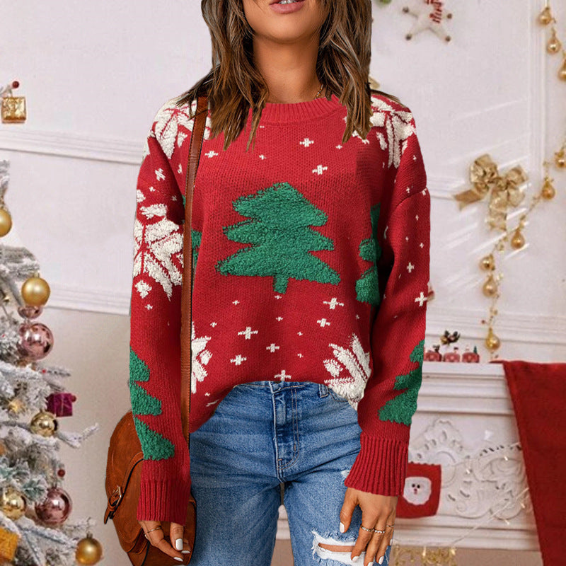Festive women's sweater with winter tree design Lune London