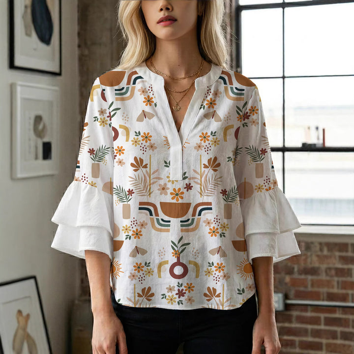 Women's blouse with ruffle details and eye-catching animal print Lune London