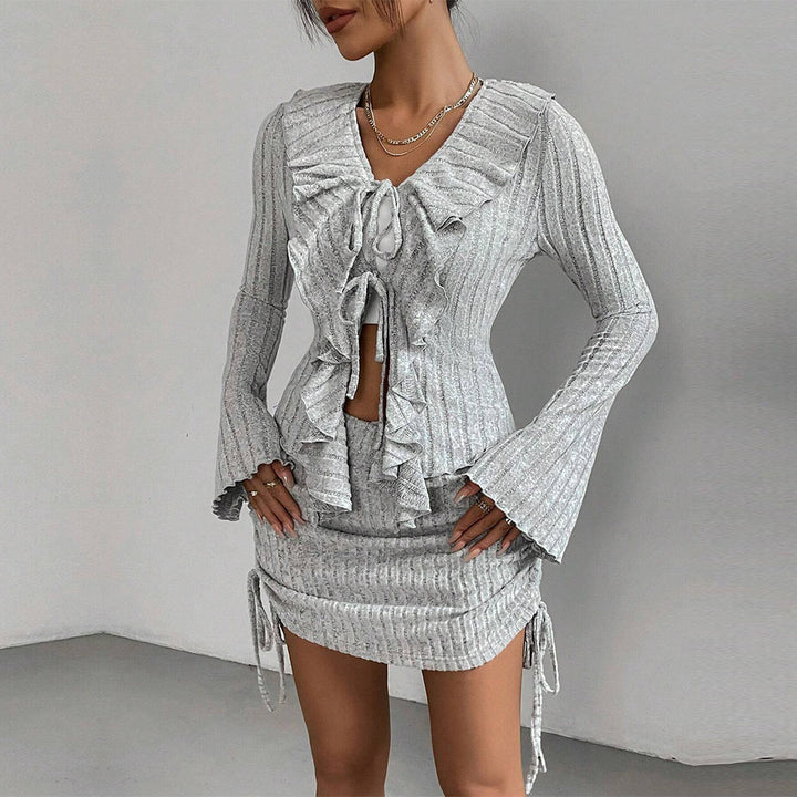Ensemble pour femmes avec haut à volants et jupe moulante Chic & Stil