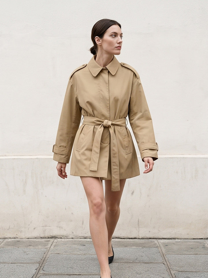 Women's short trench coat with waist belt, shoulder flaps, and adjustable cuffs Amarae