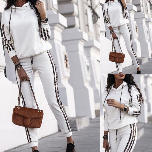 Haut de hoodie élégant sportif pour femmes avec des accents stylés Chic & Stil