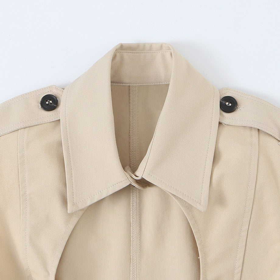 Women's sleeveless tailored trench vest with cut-out, shoulder flaps, and flap pockets Amarae