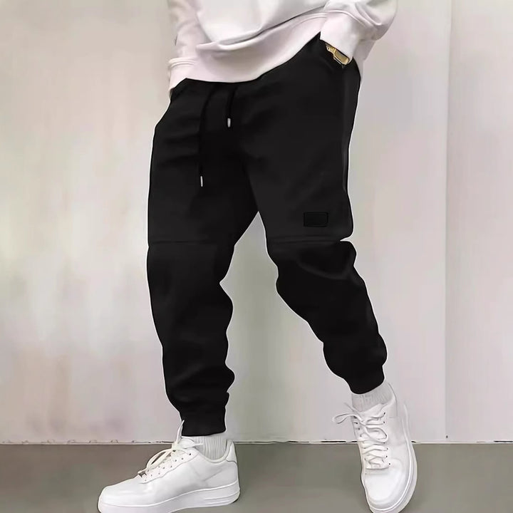 Sporty jogger pants for men with side zipper details Lune London