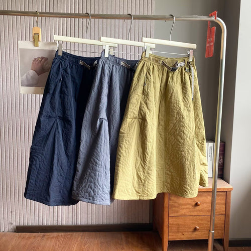 Jupe midi élégante pour femmes avec taille élastique pratique et poches latérales Chic & Stil