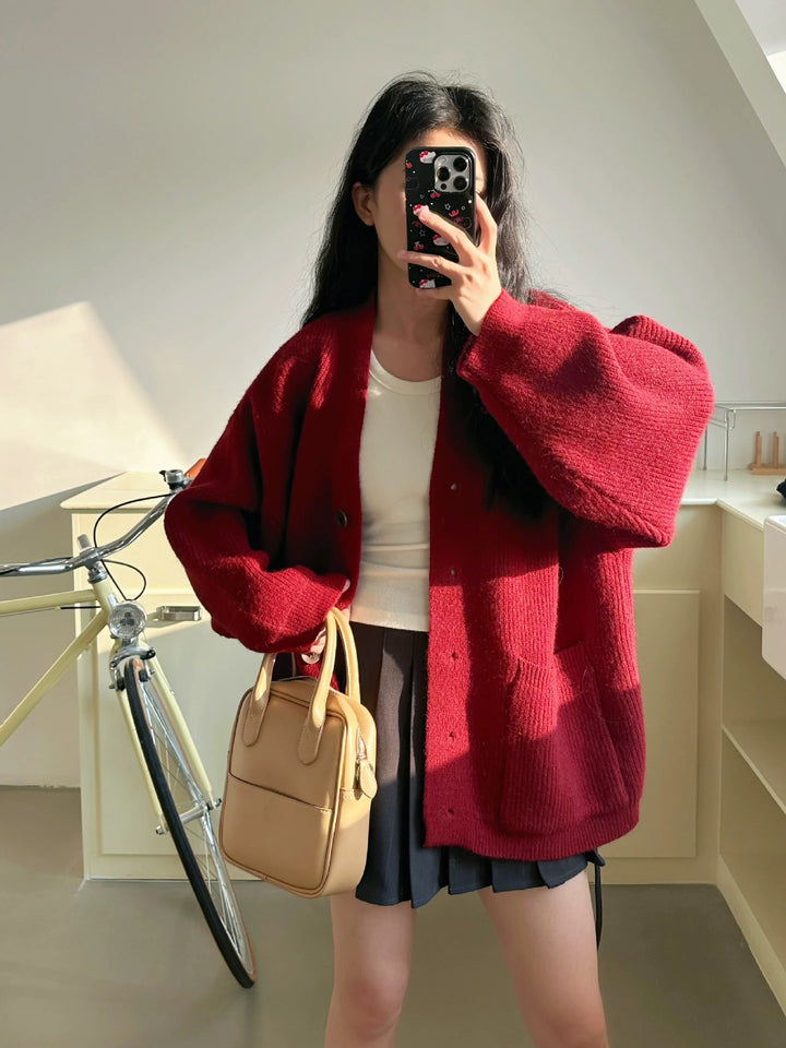 Cardigan en tricot épais pour femmes avec des détails de boutons élégants et des poches pratiques Chic & Stil