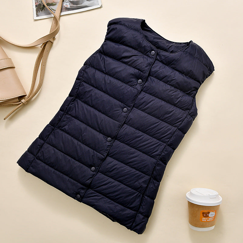 Women's sleeveless quilted thermal vest with round neck and snap button placket Amarae